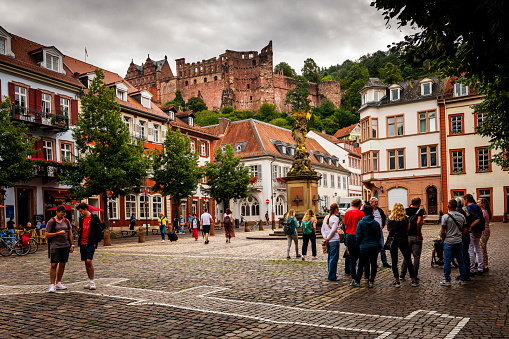 Heidelberg, Germany - August 26, 2023:  Many people in the pedestrian zone at famous city Heidelberg in Germany