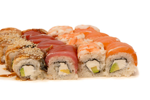 istock Sushi rolls with salmon, shrimp, eel, tuna. 1728153971