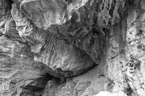 cave interior, rock wall texture. Natural rock, mineral formations.