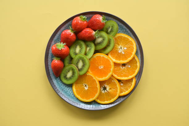 istock Top view over a plate filled with colorful fruit 1728186526