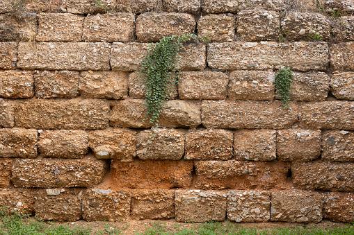 A weathered historical wall on the Acropolis