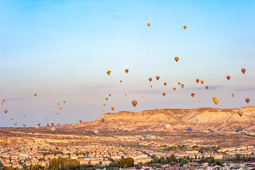 Hot air balloons taking off in the skies of Ürgüp