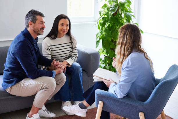 istock Psychotherapist guiding married couple in counseling session 1728297292