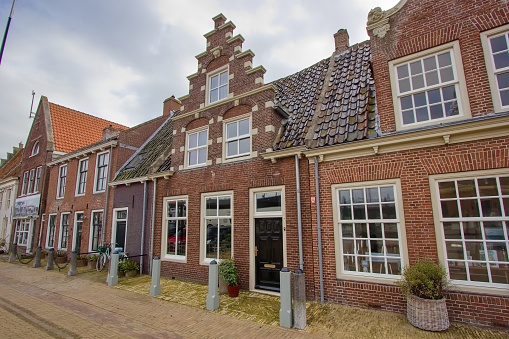 Typical old houses in the city center of harbor Harlingen, Friesland, The Netherlands