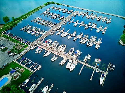 Small sailing boats moored in the yacht club of Sanxenxo on a clear Summer day, Pontevedra, Spain.