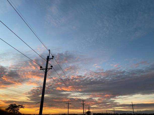 istock Traditional electric pole with cables in the afternoon 1728301163