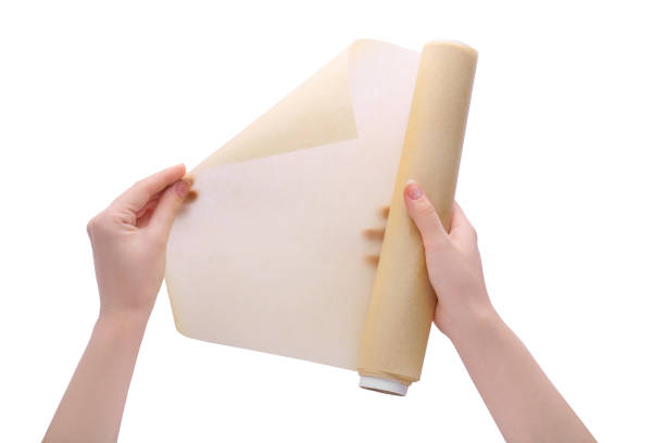 istock Woman holding baking paper on white background, closeup 1728306838