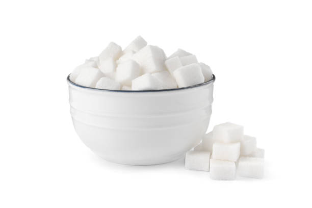 istock Bowl and refined sugar cubes on white background 1728323874