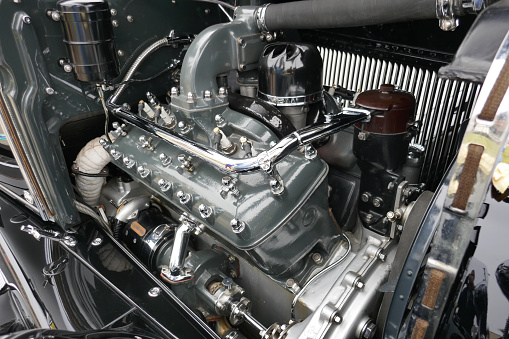Part of car engine, four valve in head for each cylinder, selective focus
