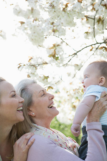 Smiling grandmother, mother and son  grandmother child baby mother stock pictures, royalty-free photos & images