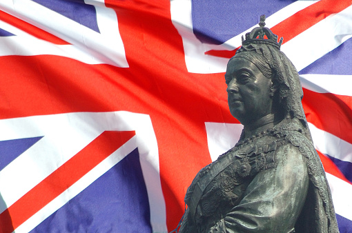 closeup of Union Jack and Queen Victoria