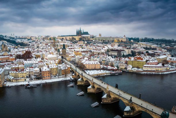 istock Panoramic winter view over the famous Charles Bridge in Prague 1728423354
