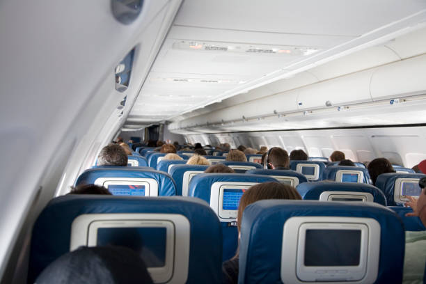 istock Commercial Airplane Cabin Full of Passengers 172843215