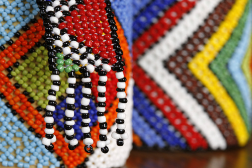 A shallow depth of field macro shot of typical Zulu beadwork from South Africa.