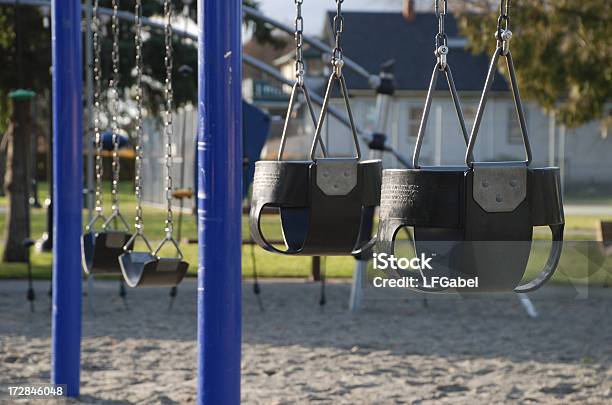 Playground Swings Stock Photo - Download Image Now - Blue, Focus On Foreground, Horizontal