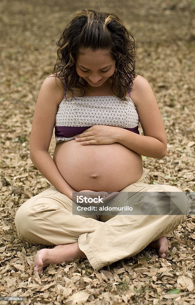Donna in stato di gravidanza - Foto stock royalty-free di Accudire