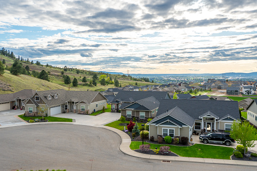 View from a hilltop in Liberty Lake, Washington, of  a newer subdivision of homes with the cities  of Spokane and Spokane Valley in the distance. Liberty Lake is a city in Spokane County, Washington, United States located adjacent to the eponymous lake. Located just over a mile west of the Washington–Idaho border, Liberty Lake is both a suburb of Spokane, Washington and a bedroom community to Coeur d'Alene, Idaho.