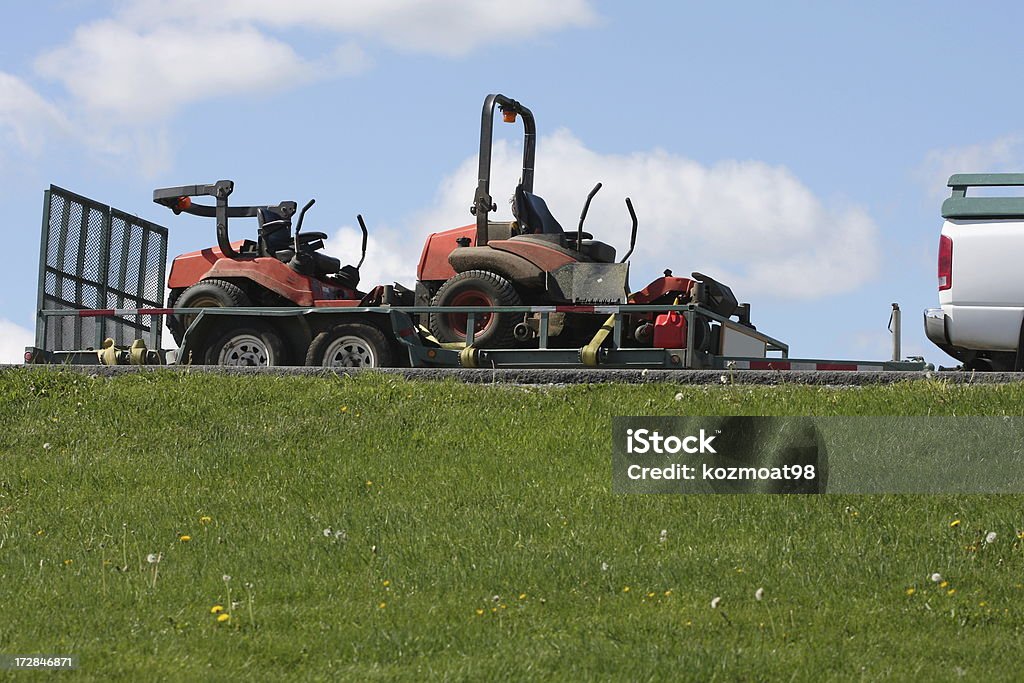 Ride On Mowers Ride on mowers on a trailer ready to work. Vehicle Trailer Stock Photo