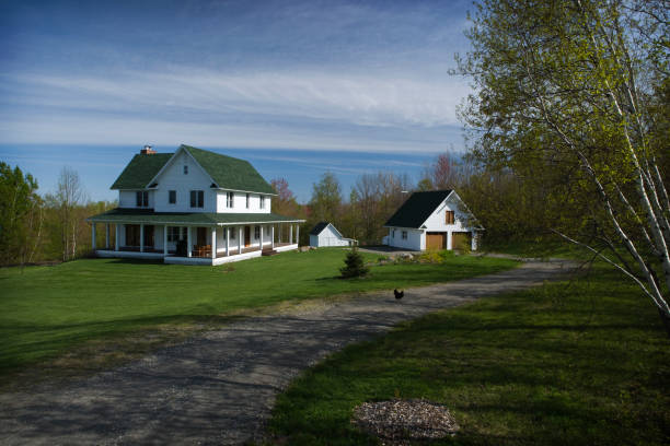 Dream house Beautiful farmhouse in a pastoral environment. Outdoors photography. Concepts: architecture; nature; landscape. old fashioned farmhouse plans pictures stock pictures, royalty-free photos & images