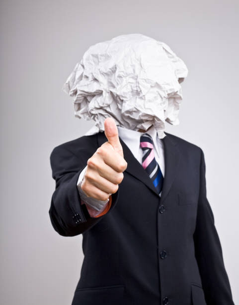 istock Man in a suit with paper on his head 172847556