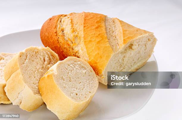 Sliced French Bread Stock Photo - Download Image Now - Baguette, Baked, Baking