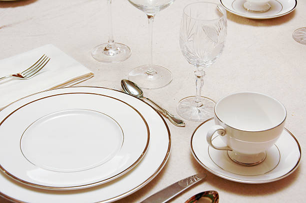 istock A set of white fine china and silverware 172848164