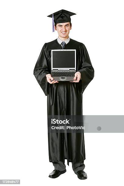 Graduate Con Una Computadora Portátil Foto de stock y más banco de imágenes de Adulto - Adulto, Adulto joven, Agarrar