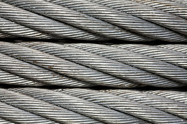 macro close up of с отделкой в виде косичек - steel cable wire rope rope textured стоковые фото и изображения