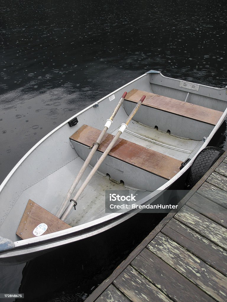 Ruderboot im Regen - Lizenzfrei Metall Stock-Foto