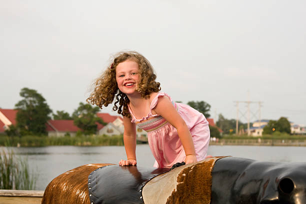istock Girl on mechanical bull 172849984