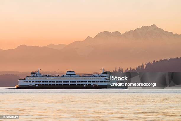 A Ferry Crossing Waters At Sunset Stock Photo - Download Image Now - Ferry, Washington State, Puget Sound