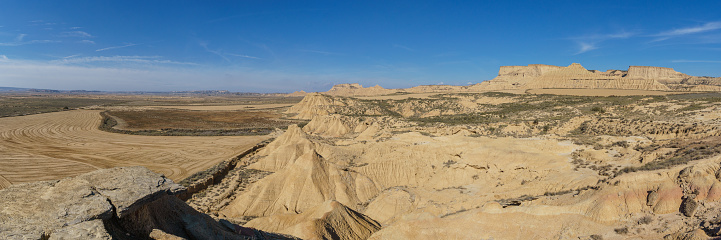 Panorama of desert landscape of the arid plateau of the Bardenas Reales seen from Mirador de Juan Obispo, Arguedas, Navarra, Spain