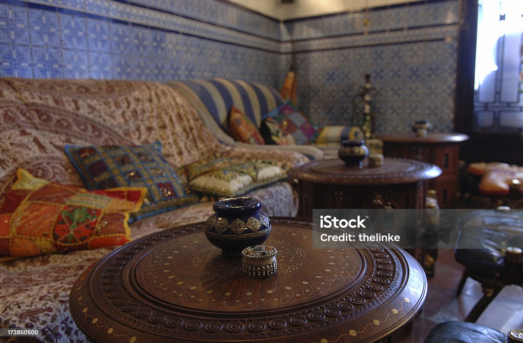 Oriental lounge Oriental lounge with round tables and hubble-bubble Cushion Stock Photo