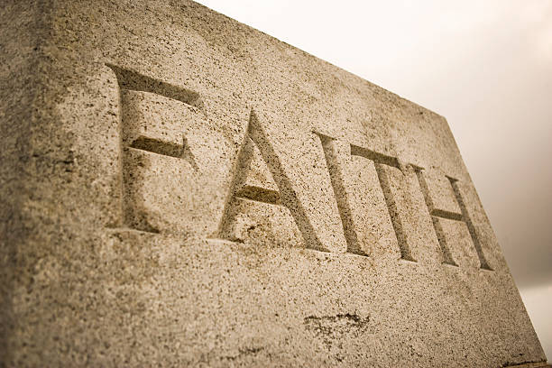 istock The word faith inscribed in granite 172850515