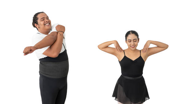 male and female ballerina ballet dancer stretching or warming up, isolated on a white background male and female ballerina ballet dancer stretching or warming up, isolated on a white background african american male ballet dancer stock pictures, royalty-free photos & images
