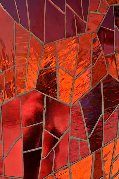 A red mosaic stained glass window stock photo