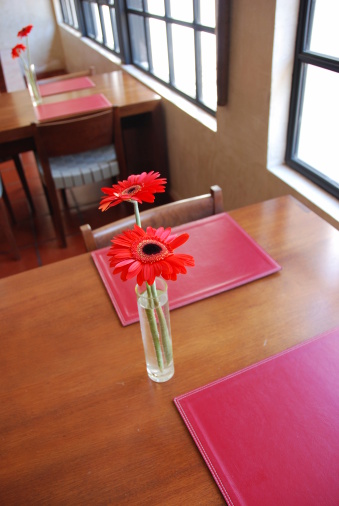 Flowers greeting the table set for two.Please see other pictures from my portfolio: