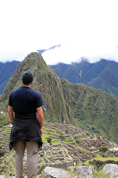 istock Man Tourist Hiker Looking the Machu Picchu, Peru 172857258
