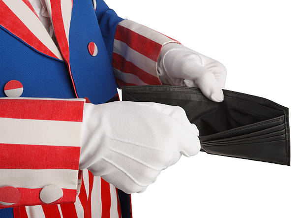 Government Spending A conceptual look at government spending. uncle sam broke stock pictures, royalty-free photos & images