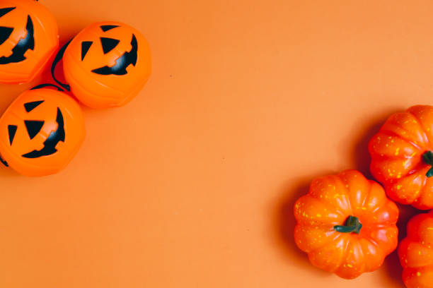 Mystery Halloween background with pumpkins. Halloween flat lay. Halloween top view. copy space.