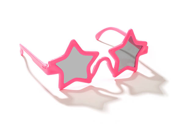bambino occhiali da sole rosa a forma di stella isolato su bianco - occhiali giocattolo foto e immagini stock