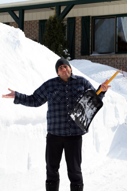 istock Desperate Man with Broken Shovel After a Big Snowstorm 172859211