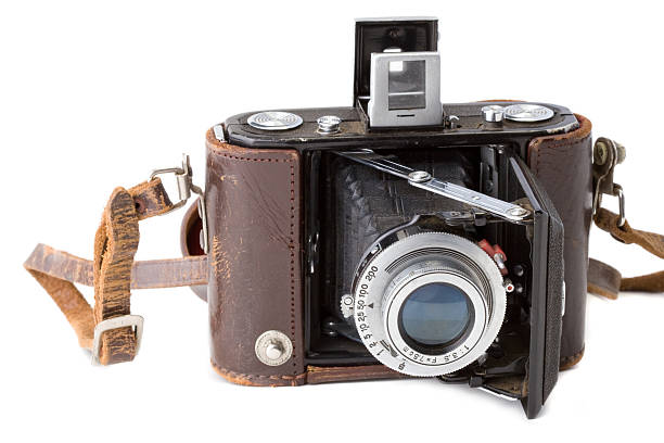 istock Vintage film camera with worn leather strap 172859653