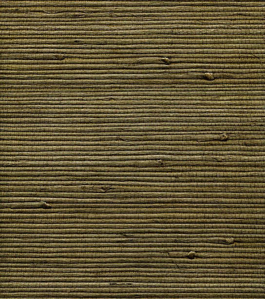 drab green woven thatch pattern stock photo