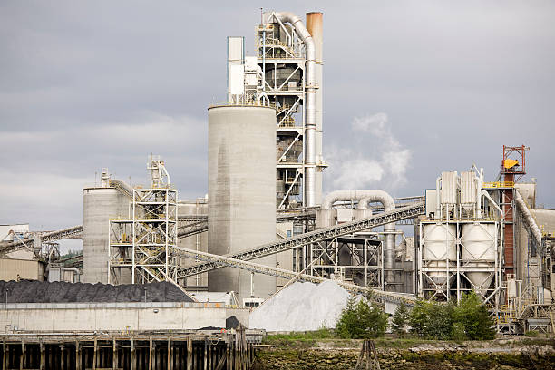 istock White exterior of an industrial concrete factory complex 172860366