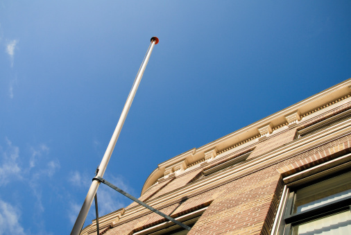 Low angle view of a flagpole.