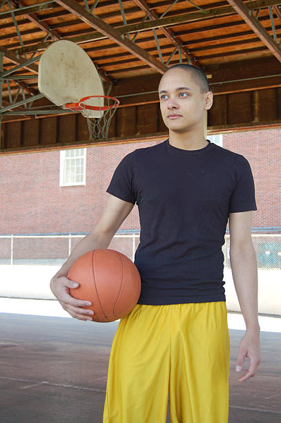 istock Basketball Player and Hoop 172860415