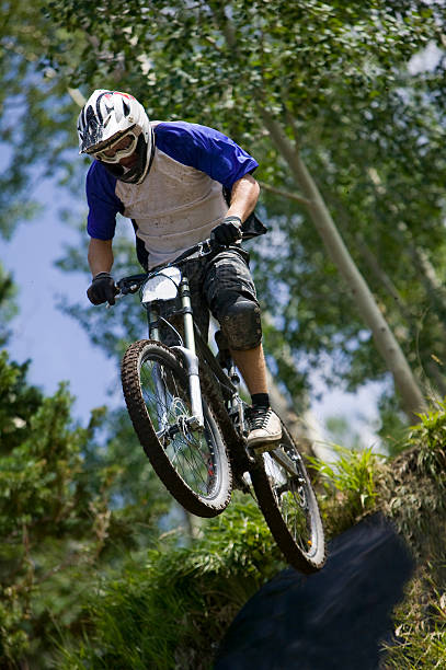 istock Mountain Bike racer getting air 172860419