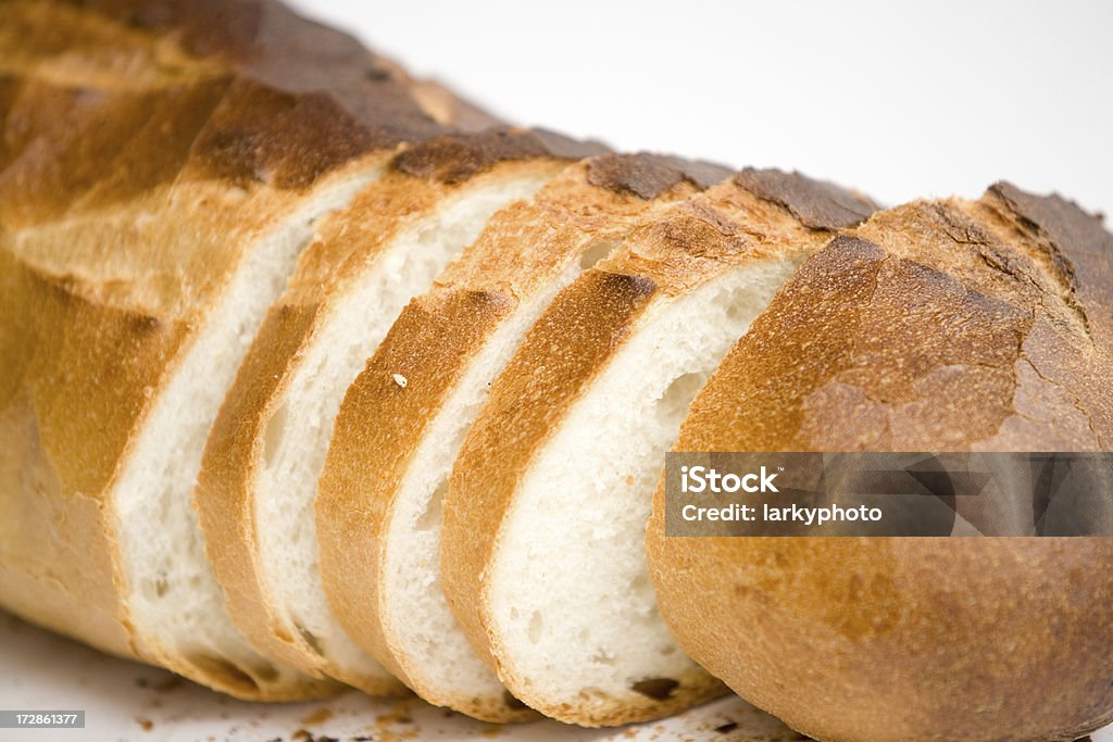 Rodajas de Pan de trigo fresco blanco - Foto de stock de Al horno libre de derechos