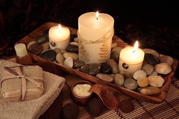 istock Aromatherapy Spa Setting with candles, stones, and accessories 172861510